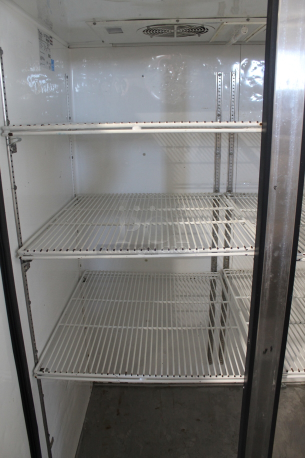2012 True TG2R-2S ENERGY STAR Stainless Steel Commercial 2 Door Reach In Cooler w/ Poly Coated Racks on Commercial Casters. 115 Volts, 1 Phase. Tested and Working! - Image 6 of 8
