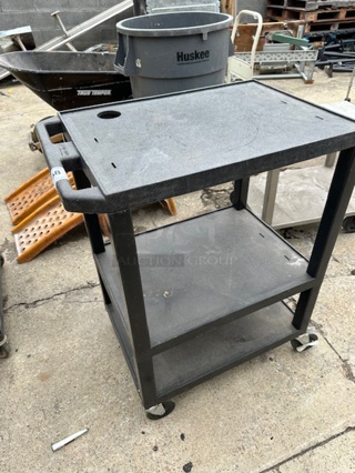 One TUFFY Cart With 3 Shelves On Casters. 27X18X34.
