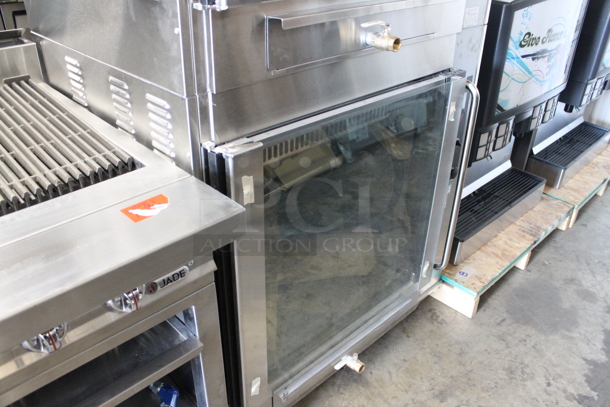BRAND NEW! BKI VGG-16F Stainless Steel Commercial Electric Powered Rotisserie Oven on Commercial Casters. Stock Picture Used as Gallery Picture. 208 Volts, 3 Phase. Goes GREAT w/ Lot #4! - Image 11 of 11