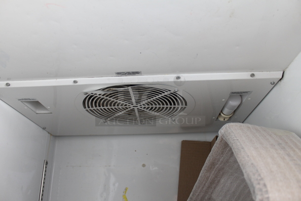 2015 True TG1R-1S ENERGY STAR Stainless Steel Commercial Single Door Reach In Cooler w/ Poly Coated Racks on Commercial Casters. 115 Volts, 1 Phase. Tested and Working! - Image 7 of 8