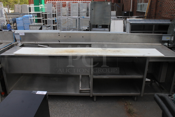 Stainless Steel Commercial Table w. Back Splash and Under Shelves. - Image 1 of 6