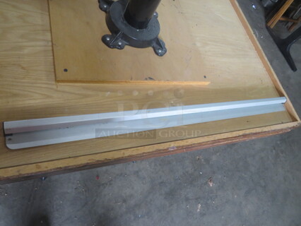 One 48 Inch Ticket Rail.