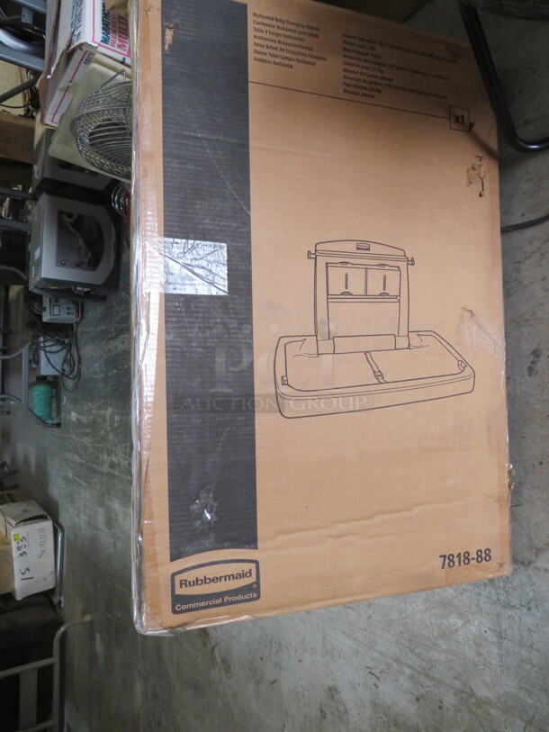 One NEW Rubbermaid Changing Station. - Image 1 of 1