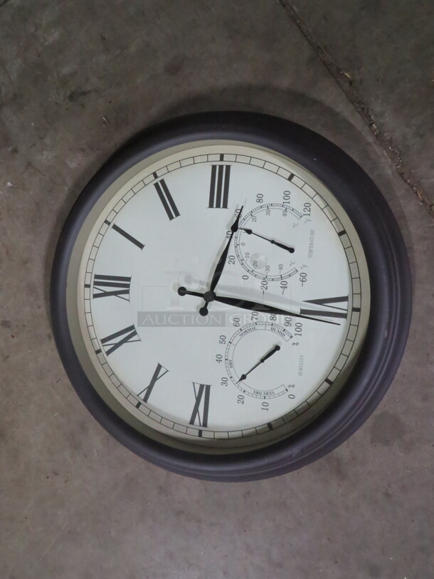 One 28 Inch Round Clock.