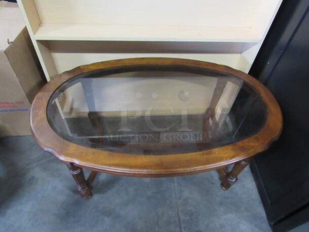 One Wooden Glass Coffee Table. 46X28