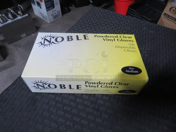 Box Of 100 Medium Poly Gloves. 2XBID - Image 1 of 1