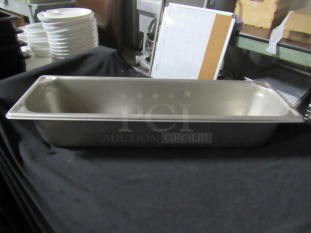 One Half Size Long 4 Inch Deep Hotel Pan. 