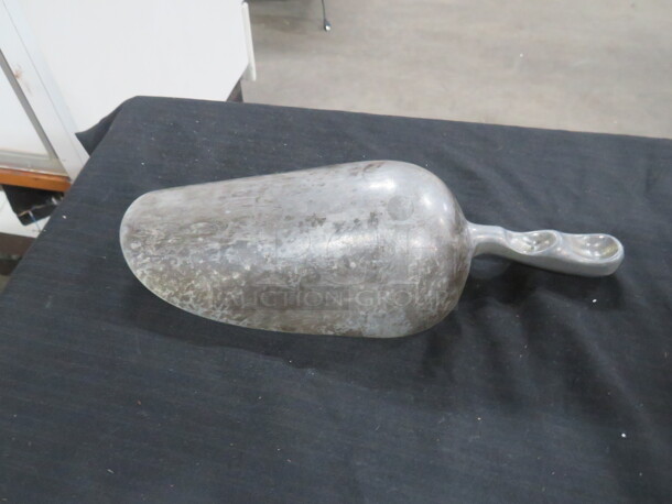 One Aluminum 24oz Scoop. - Image 1 of 1