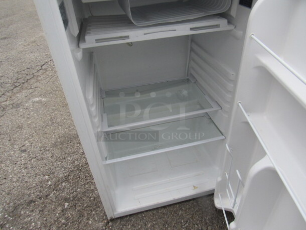 One GE Refrigerator. 115 Volt. 20X22X32.5 Small Dent See Pic. WORKING