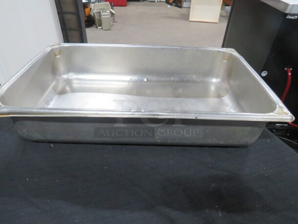 One Full Size 4 Inch Deep Hotel Pan.