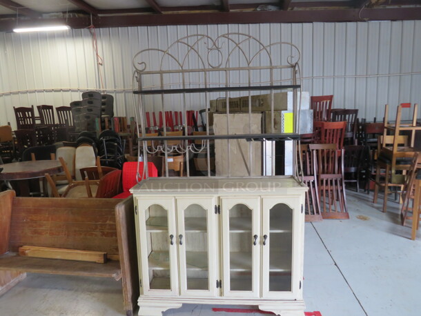 One Wooden/Metal 2 Piece Buffet/Wine Holder, With 4 Doors And 2 Under Shelves, And 2 Over Shelves With Wine Bottle And Glass Holders. One Door Glass Broken. 50X13X85 - Image 1 of 5