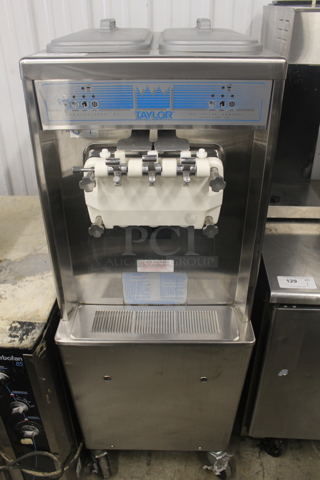 Taylor 794-33 Stainless Steel Commercial Floor Style Water Cooled 2 Flavor w/ Twist Soft Serve Ice Cream Machine on Commercial Casters. 208-230 Volts, 3 Phase.