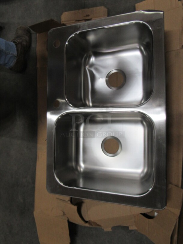 One NEW Stainless Steel Elkay 2 Compartment Drop In Sink. 33X22X9. Dented See Pic.