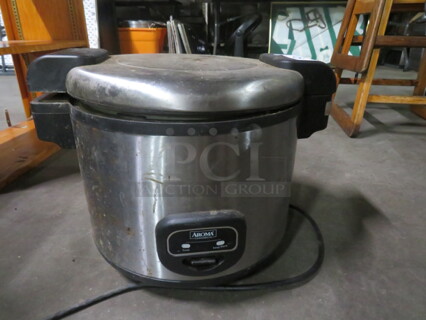 One Aroma Commercial Rice Cooker. Model# ARC-11305. 1550 Watt. 120 Volt.