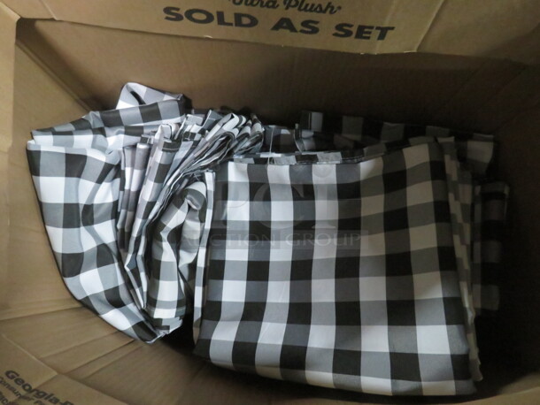 One Lot Of Black/White Check Table Cloths.
