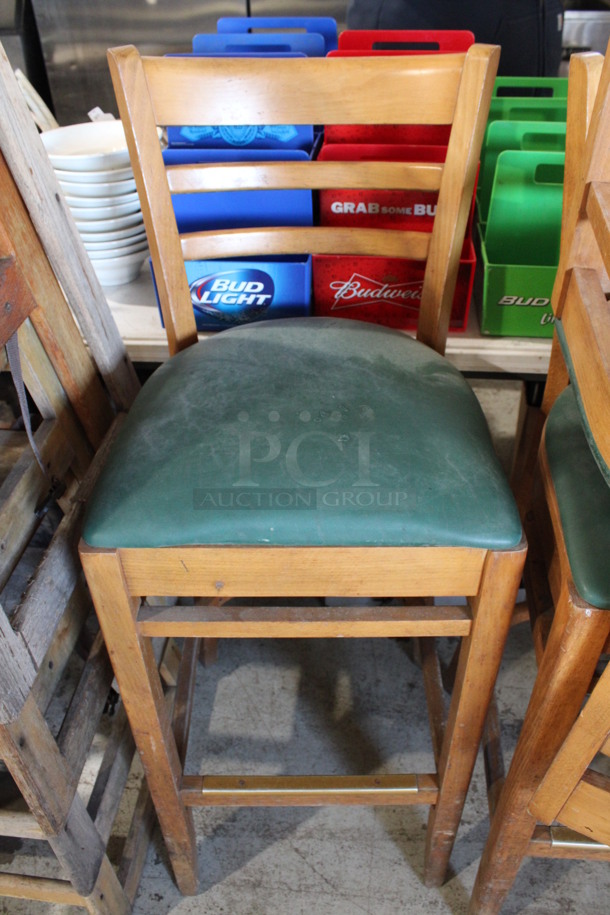 3 Wooden Bar Height Chairs w/ Green Seat Cushion. Stock Picture - Cosmetic  Condition May Vary.  17x16x43. 3 Times Your Bid!