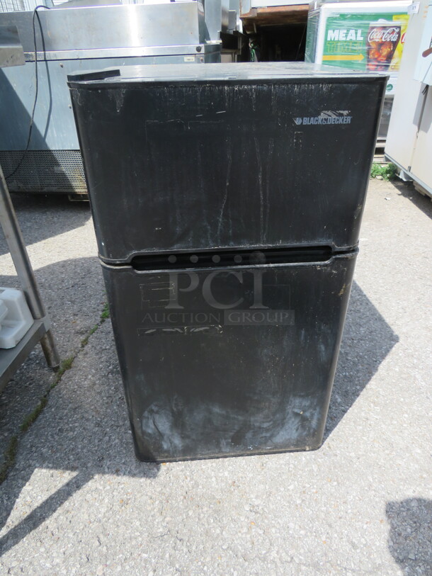 One Black And Decker Under Counter Refrigerator/Freezer. Model# BCD33B. 115 Volt. 19X19.5X33.5. - Item #1112410