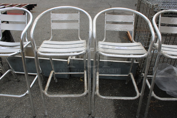 3 Metal Bar Height Chairs w/ Arm Rests. Stock Picture - Cosmetic Condition May Vary. 20x21x40. 3 Times Your Bid!