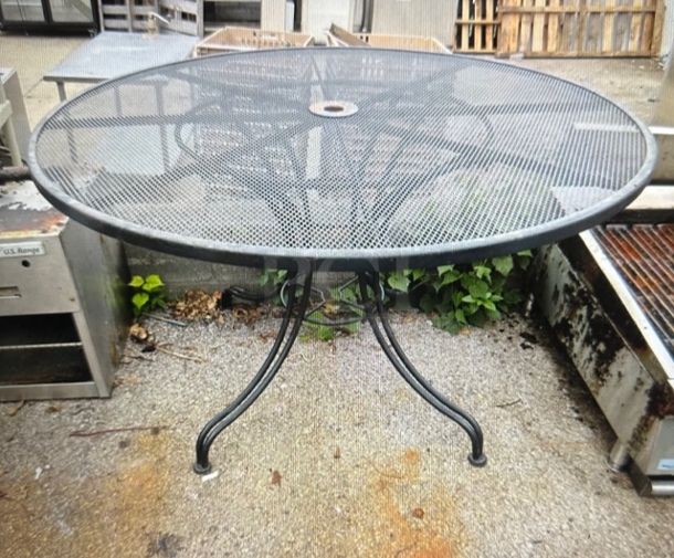 One Round Black Metal Patio Table. 48X29 - Image 1 of 2