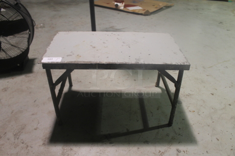 Table on Metal Legs.
