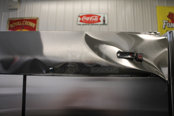 BRAND NEW SCRATCH AND DENT! Avantco A-49R-HC 54" Solid Double Door Stainless Steel Reach-In Refrigerator. 115V. Tested and Working! - Image 3 of 9