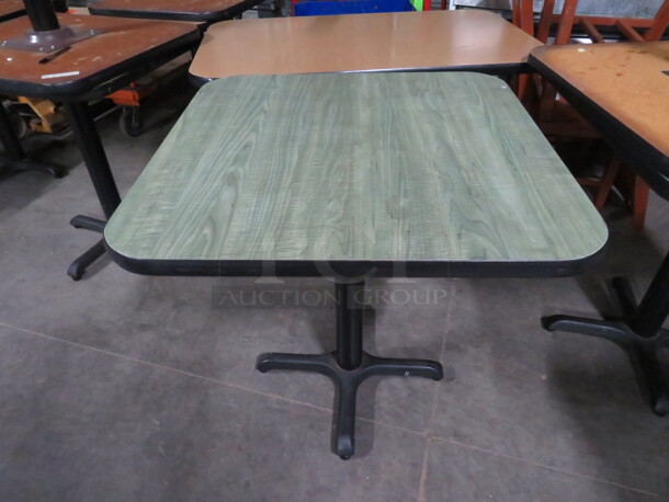 One Green Laminate Table Top On A Pedestal Base. 30X30X30 - Image 1 of 2