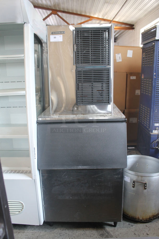 Hoshizaki Commercial Stainless Steel Electric Ice Machine With Storage Bin On Black Legs.  - Image 1 of 9