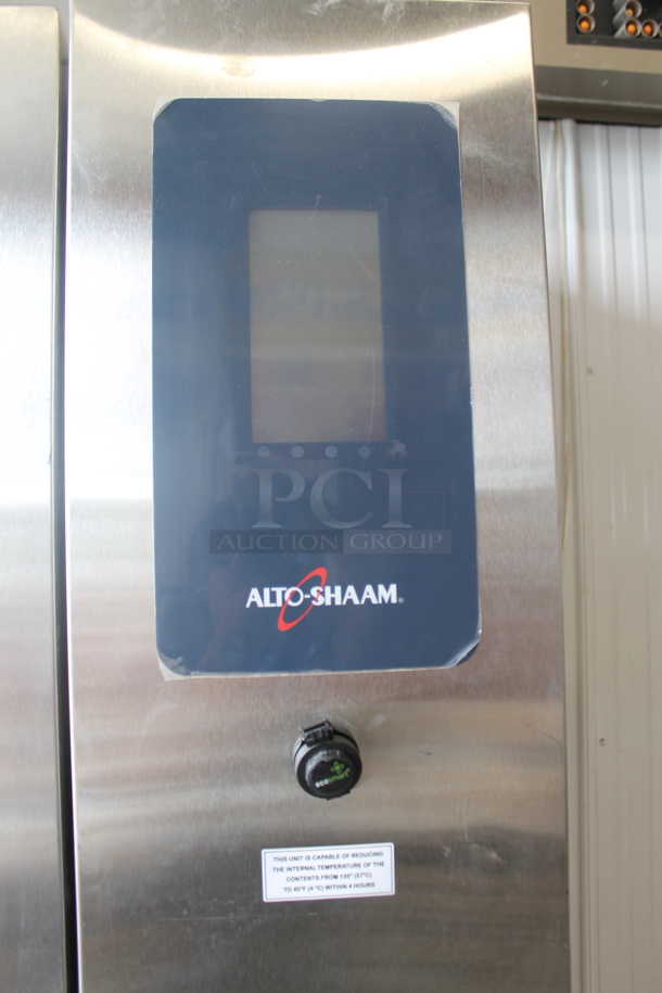BRAND NEW! 2019 Alto Shaam QC3-100R Stainless Steel Commercial Floor Style Blast Chiller w/ 3 Probes. Comes w/ Remote RivaCold Compressor and Metal Pan Transport Rack. Pan Rack Appears To Be a Little Too Big To Roll In. 115/208-230 Volts, 1 Phase. Stock Picture Used as Gallery Picture - Image 4 of 12