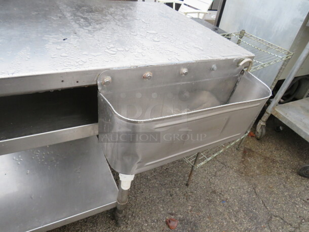 One Stainless Steel Table With 2 Stainless Under Shelves, And Front Dipperwell On Casters. 60X24X36 - Image 2 of 2