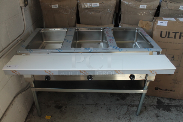 BRAND NEW SCRATCH AND DENT! Advance Tabco SW-3E-120 Stainless Steel Commercial Electric Powered 3 Bay Steam Table w/ Under Shelf. 120 Volts, 1 Phase. Tested and Working! - Image 1 of 4
