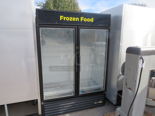 One True 2 Door Glass Display Freezer With Racks On Casters. 115/208-230 Volt. 1 Phase. Model# GDM-49F-LD.