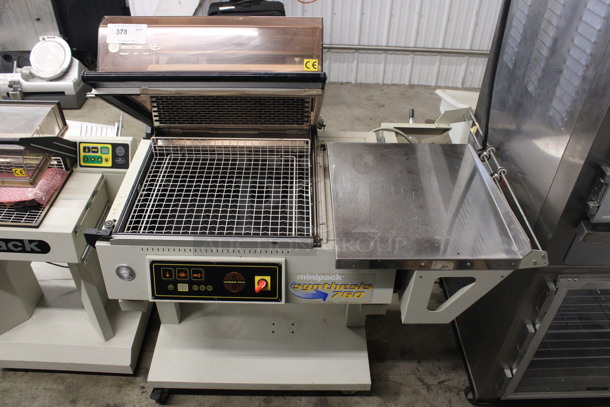Minipack Model Synthesis 760 Metal Commercial Floor Style Bar Heat Sealer Shrink Wrap Station on Commercial Casters. 51x31x48. Tested and Working!
