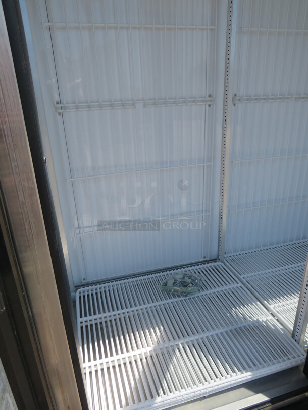 One True 3 Door Glass Display Freezer With 12 Racks. Model# GDM-72F-LD. 115/208-230 Volt. 1 Phase. 78X30X79.  - Image 2 of 4