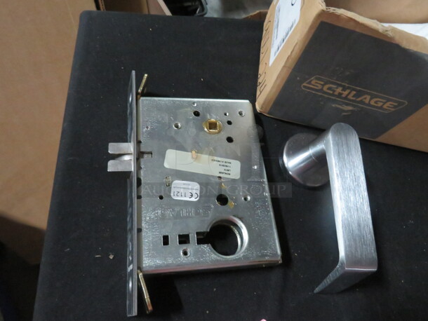 One Schlage LV9000 Series Door Lever And Hardware.