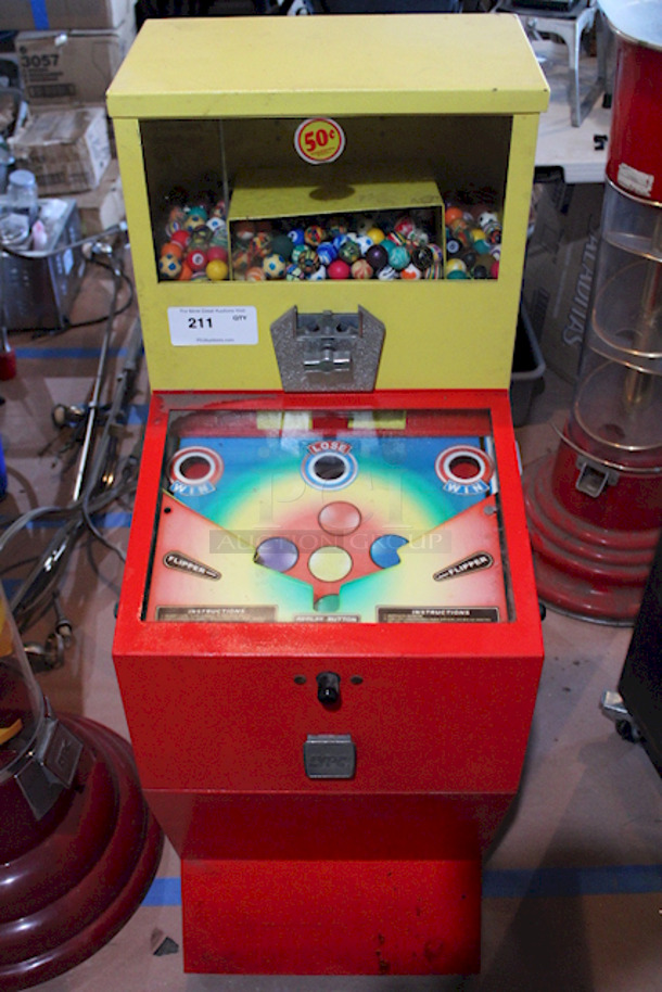 EXCITING! Impulse Industries Play More Win More Gumball Machine, High Quality Pinball Style Gumball Vending Machine. Accepts Quarters, .50¢ To Play. On Heavy Duty Commercial Casters, Holds Up To $400.00 In Quarters. Capable Of Vending Gumballs, Bouncy Balls, Or Jawbreakers. Currently Filled With Bouncy Balls. 54" H x 18" W x 24" D 
 - Image 3 of 10