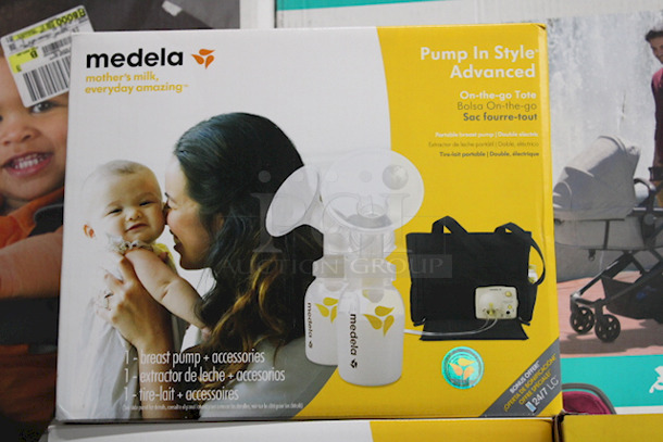 AWESOME!! Medela Pump In Style Advanced Breast Pump with On-the-go Tote with International Adapter - Image 1 of 6