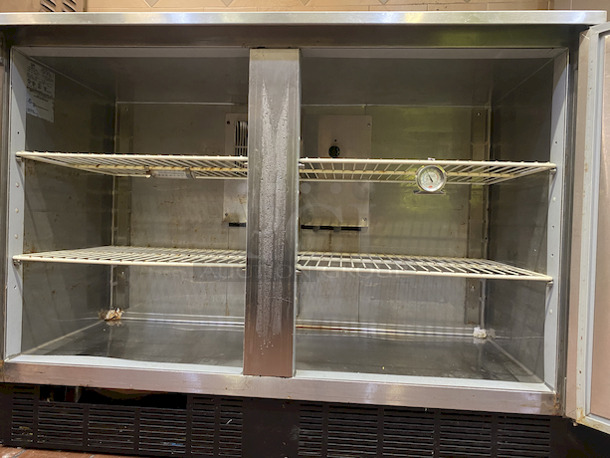 10 out of 10! Duke RUF-48 M 2 Door Refrigerated Work Counter on Commercial Casters. 120volt

Tested. Perfect Working Order. 

30"d x 48"w x 36-1/2"h. 
 - Image 4 of 6
