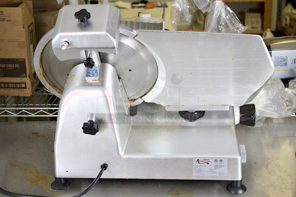 LIKE NEW CONDITION! Avantco 177SL312 12" Manual Gravity Feed Meat Slicer - 1/3 hp - Image 6 of 7