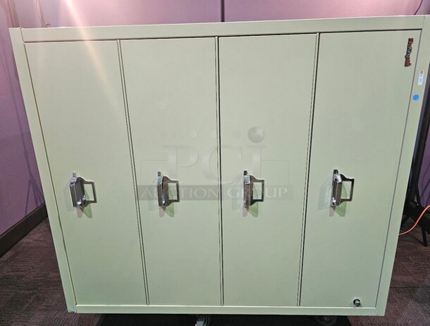 Fire King fireproof lateral File safe with 4 drawers. A very heavy, well-made piece in great condition! Minor scuffs or signs of wear may be evident, but still an awesome safe to protect important items and/or documents. Measures 53” H x 44.5” W x 22” D.  

 - Image 3 of 3