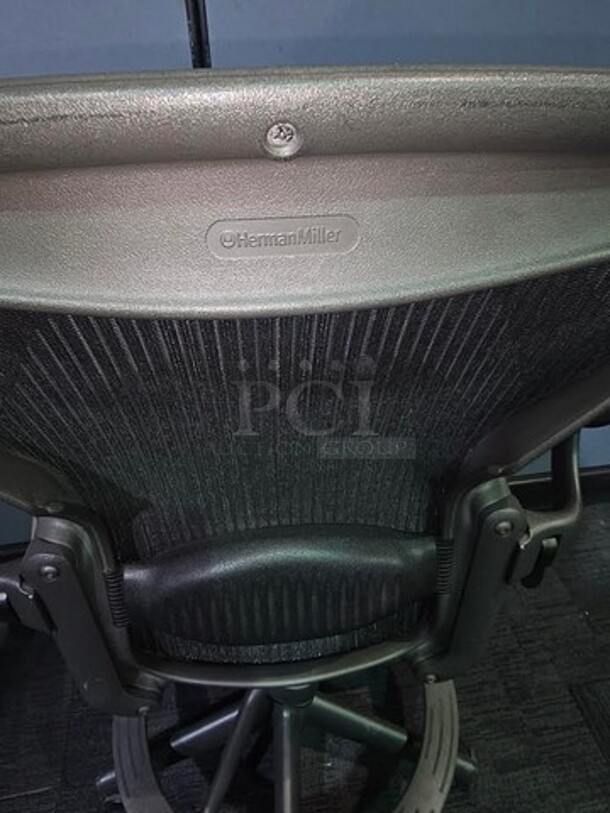 Herman Miller Aeron Desk Chair- black- In great used condition- very high end chair with minor wear. No broken pieces or tears. 48"H x 28"W x 23"D.  - Image 2 of 3