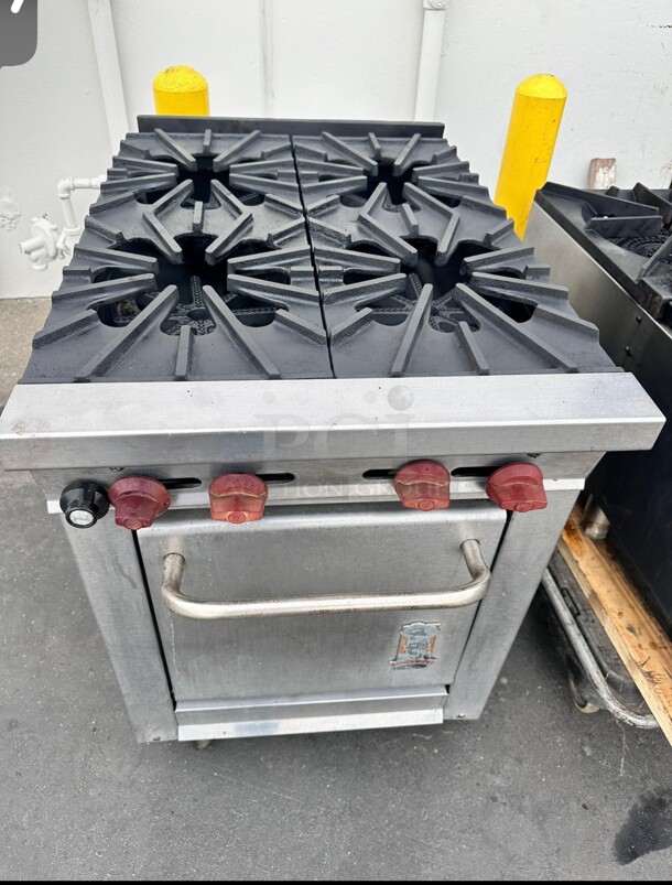 Montague 124-5 Legend 24 inch Heavy Duty Gas Range With Four Open Burners Working - Image 1 of 8