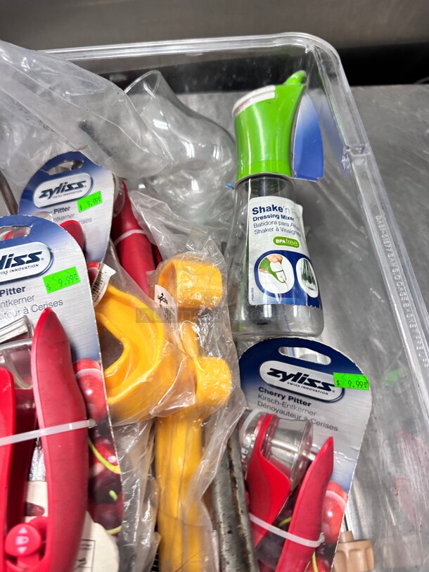 One Lot Of Kitchen Items Includes Dressing Mixer Cherry Pitter and Other Items  - Image 2 of 8