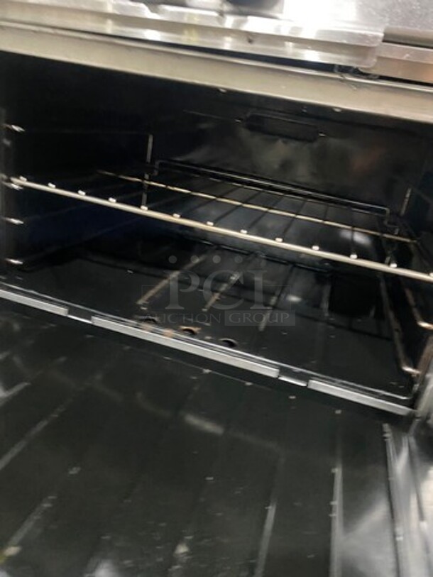 Garland Commercial Natural Gas Powered 6 Burner Stove! With Back Splash! With Convection Oven Underneath! Metal Oven Rack! All Stainless Steel! - Image 5 of 9