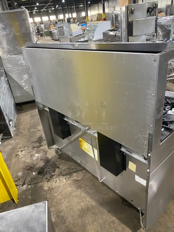 GREAT FIND! Garland Commercial Gas Powered 6 Burner Stove With Right Side Flat Griddle! Griddle Has Side Splashes! With Raised Back Splash And Salamander Shelf! With 2 Oven Underneath! Metal Oven Racks! All Stainless Steel! On Casters! - Image 4 of 11