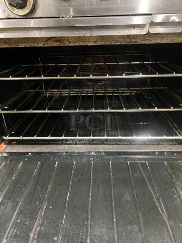 Garland Commercial Natural Gas Powered 6 Burner Stove! With Raised Backsplash & Overhead Salamander Shelf! With Convection Oven Underneath! All Stainless Steel! Model H286RC Serial 0303RG0779! On Casters! WORKING WHEN REMOVED! - Image 6 of 12