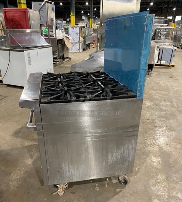 Garland Commercial Natural Gas Powered 6 Burner Stove! With Raised Back Splash! With Oven Underneath! Metal Oven Rack! All Stainless Steel! On Casters! - Image 3 of 8