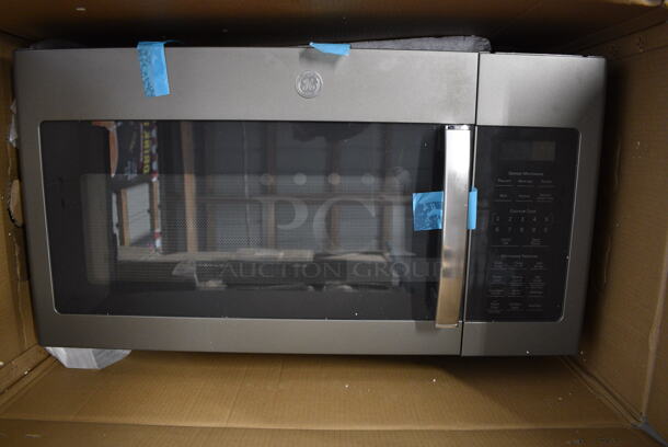 BRAND NEW IN BOX! General Electric Over The Range Microwave Oven. 31x18x18