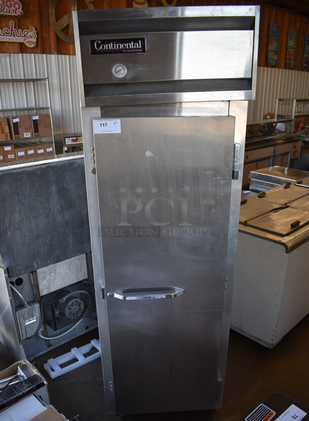 Continental 1R Stainless Steel Commercial Single Door Reach In Cooler on Commercial Casters. 115 Volts, 1 Phase. 26x34x83. Tested and Powers On But Does Not Get Cold