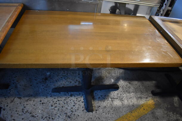 2 Wood Pattern Tables on Black Metal Table Base. 46x28x29.5. 2 Times Your Bid!