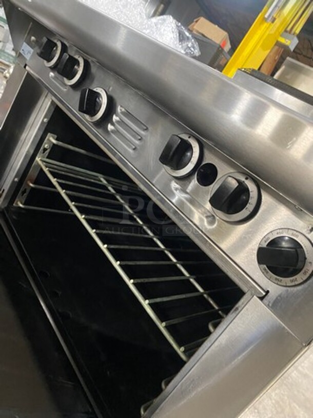 Garland Commercial Natural Gas Powered 4 Burner Stove! With Back Splash! With Oven Underneath! Metal Oven Rack! All Stainless Steel! On Casters! Model: 144R SN: 1601100100589 - Image 8 of 10